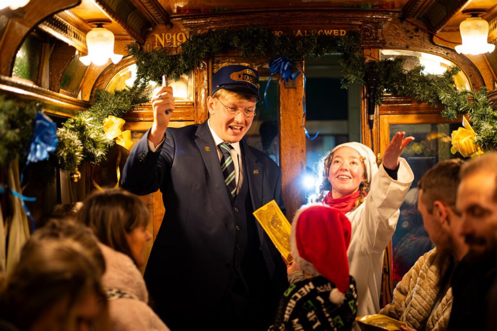 The Conductor on board the polar express east devon at Seaton Tramway